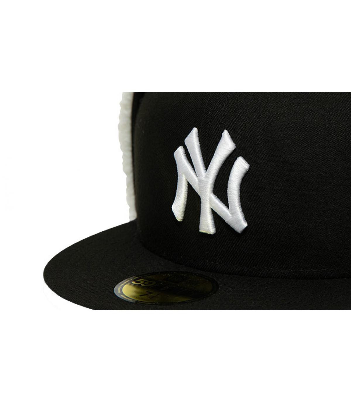 black and white NY cap ear prote